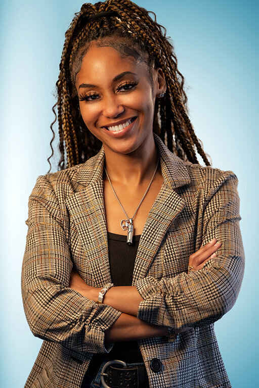 Consistent corporate headshot of a professional woman photographed on a neutral background in Dallas